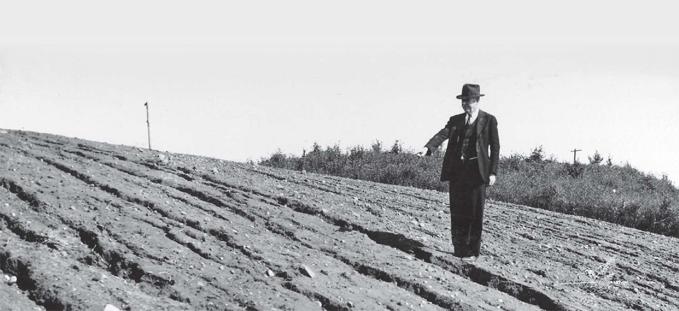 Hugh Hammond Bennett is considered the father of the U.S. Soil Conservation Service, the predecessor to the Natural Resources Conservation Service. He’s shown here inspecting some serious water erosion. USDA photo